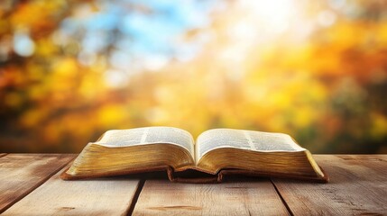 Open book on a wooden table with golden autumn sunlight, blurred nature background, concept of knowledge, reading, and tranquility.