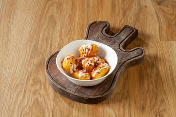 Crispy snacks on a guitar-shaped board
