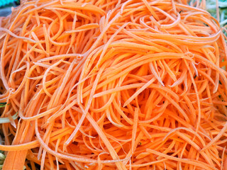 Raw carrot spaghetti noodles detail