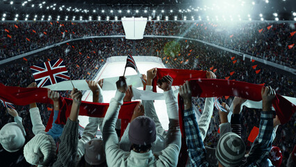 Panoramic view of packed stadium during winter sports game, with fans holding flags and scarves,...