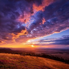 Obraz premium Dramatic sky background with vibrant colors of sunrise or sunset, perfect for landscape photography, travel content, or inspirational visuals