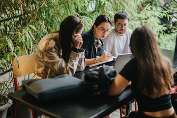 A group of high school friends collaborating on assignments in a cozy coffee bar setting. They are focused on studying together, enjoying the relaxed atmosphere.