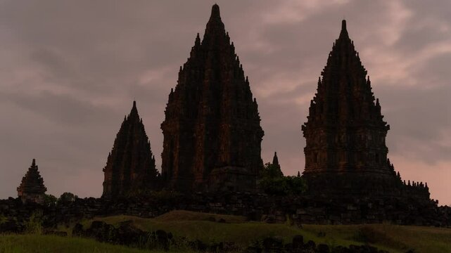 Yogyakarta, Indonesia - Time Lapse Prambanan Candi Roro Jonggrang on Morning Sunrise, a 9th century temple dedicated to the Hindu Trimurti, the trinity of Brahma, Vishnu and Shiva