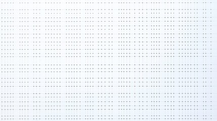Close-up of a sheet of dotted paper with a grid pattern.