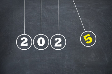 New Year 2025 Newton's Cradle on Chalkboard