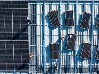 The solar photovoltaic power station on the factory roof