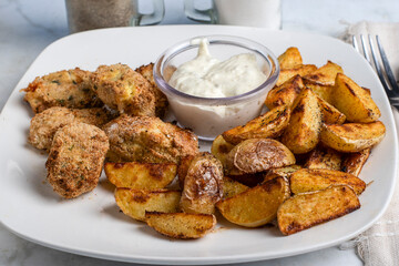 haddock  bites  with potato wedges