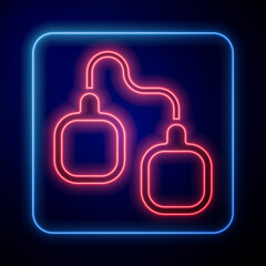Glowing neon Handcuffs icon isolated on black background. Vector