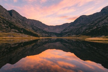 Fototapeta premium Mountain Lake Reflecting Sunset Sky Colors