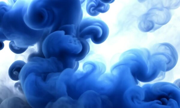 Abstract blue and grey smoke cloud explosion isolated on white background.