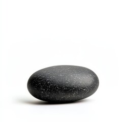 A perfectly round stone smoothed by river currents, isolated on a white background
