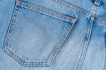 Back pocket of old, worn jeans.