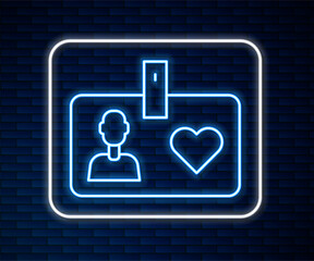 Glowing neon line Identification card volunteer icon isolated on brick wall background. Volunteer id card or badge. Vector