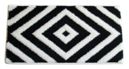 PNG A decorative rug featuring a bold black and white diamond pattern with diagonal stripes.