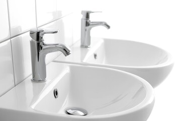 Fototapeta premium Two white sinks placed together, ideal for decoration or setup scenarios