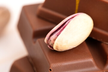 One salted pistachio close up 