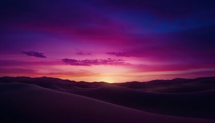 Obraz premium A vibrant sunset casts purple and blue hues over rolling sand dunes, creating a serene desert landscape filled with tranquility.