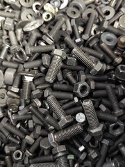 metal screws and nuts made of tempered steel, screw concept