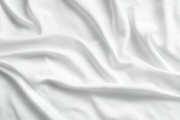 Fototapeta premium Elegant white fabric with soft folds and textured surface.