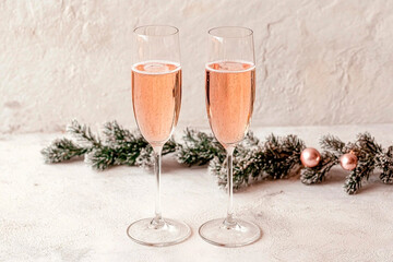 Glasses of champagne on a light background, New Year's mood. New Year concept. Generative AI