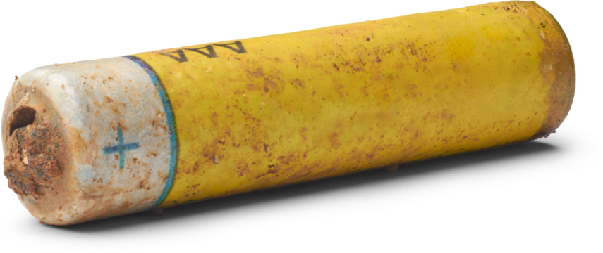 close-up of discarded old corroded battery thrown outdoors isolated white background, hazardous materials leak into the soil and contaminate environment