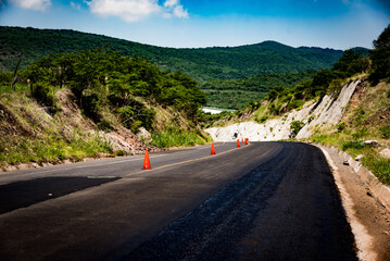 cones on the asphalt in the middle of the road