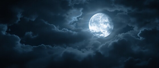 Obraz premium Mystical Night Sky with Full Moon Illuminating Dark Clouds
