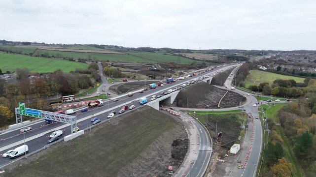 Major road work causing long traffic jam on UK highway during busy afternoon