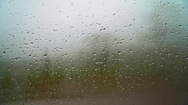 Rainy weather with interior glass condensation in a car