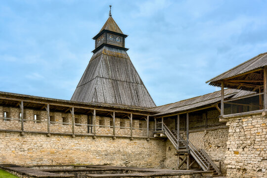 View of the Vlasyevskaya Tower from inside the Pskov Kremlin. Wooden tower with an observation deck on top.