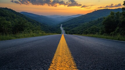 Scenic road through lush mountains at sunset.