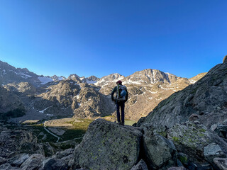 A young man enjoys a backpacking trip in the Wind River Range of Wyoming.
