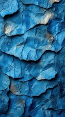 Fototapeta premium A Deep Dive into the Intricate Beauty of Crinkled Blue Paper