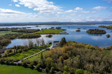 Wide high-angle aerial photograph of Cargin Castle on the shores of Lough Corrib