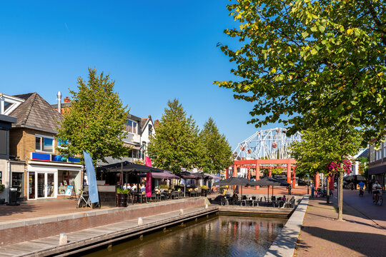 Shopping center of Drachten with canal on a sunny day in summer , Friesland, Netherlands