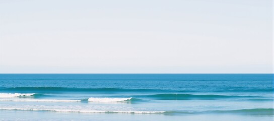 Obraz premium Minimalist background features a tranquil ocean horizon during the Geelong Cup race highlighting waves crashing at Torquay Victoria