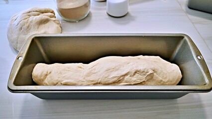 Bread dough in bread pan ready to be bake
