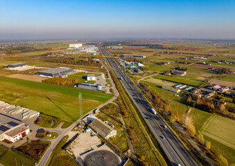 Panoramic view of Warsaw suburbs Malopole and Wola Rasztowska with S8 express way exit route...