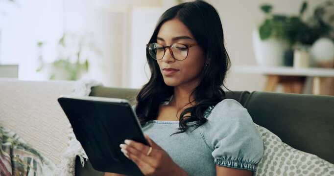 Woman, thinking and tablet in home for remote work, creative writing or online journal. Freelance writer, tech or idea in living room for storytelling, artistic process or research for report on sofa