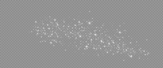 The dust sparks and white stars shine with special light. Vector sparkles on a transparent background. Christmas light effect. Sparkling magical dust particles.