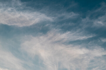 beautiful dreamy white clouds on evening sky - natural color background