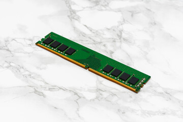 Green computer RAM Sticks sits on a white countertop