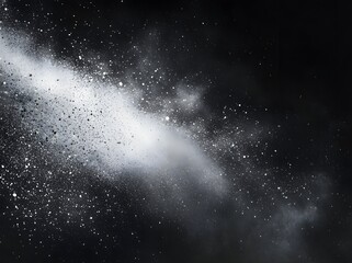 Fototapeta premium Abstract image of white powder explosion against a black background. The fine particles create a dramatic, swirling effect.