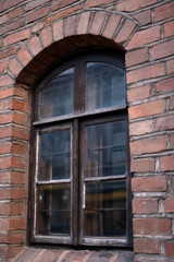 Obraz premium photo Charming Rustic Brick Wall with Vintage Wooden Window: Aesthetic Elements of Architectural Design and Historical Rustic Styles Captured in a Single Timeless Photograph