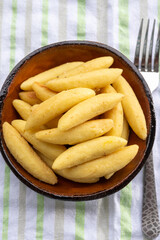 Schupfnudel or Fingernudel, finger noodle, dumpling or thick noodle in German and Austrian cuisine, similar to Central European kopytka and Italian gnocchi