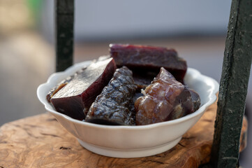 Pieces of very matured cured ham jamon serrrano iberico