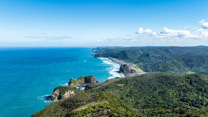 Fototapeta premium views of Auckland west coast Piha beach from high above the cliffs on the Mercer bay loop walk
