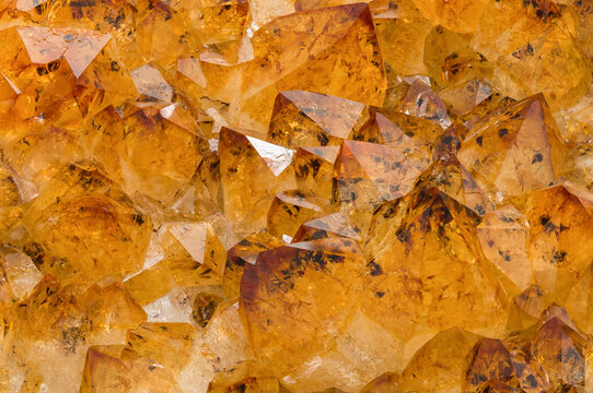 Detailed macro of citrine quartz crystals with iron oxide