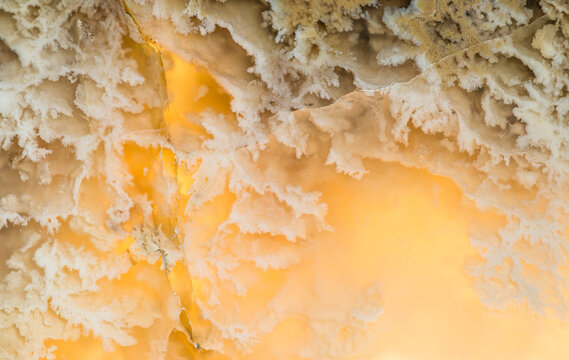 Abstract close-up of backlit onyx stone texture