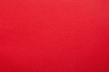 Fototapeta premium Red paper fabric texture. Red canvas embossed cardboard texture as a background